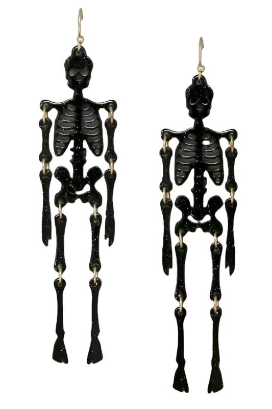 A pair of Skeleton Acrylic Dangle Earrings in Black by us jewelry house, featuring moveable joints, displayed against a plain grey background.