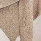 A close-up of a beige wool coat with welt pocket and pointed hem, styled with the JC Sunny Fashion Cashmere-Blend Knit Triangle Shawl featuring a cross-front design, set against a neutral background.