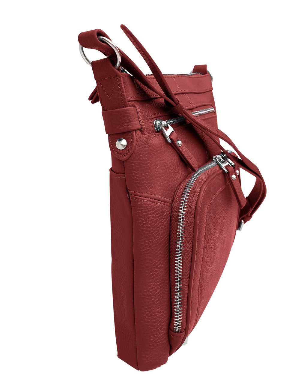 Side view of the slim red 3018 Crossbody shoulder bag with organizer front by Roma Leathers, Inc., featuring silver zippers, a spacious main compartment, and adjustable shoulder straps for comfort.
