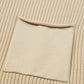 Close-up of Shewin's beige Patch Pocket Ribbed Knit Short Sleeve Sweater, ideal for transitional weather.