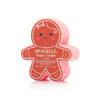Light pink Spongelle Holiday Bath Soap Sponges in the shape of a gingerbread man, featuring a red face with a bow, printed product text, and a luxurious feel.