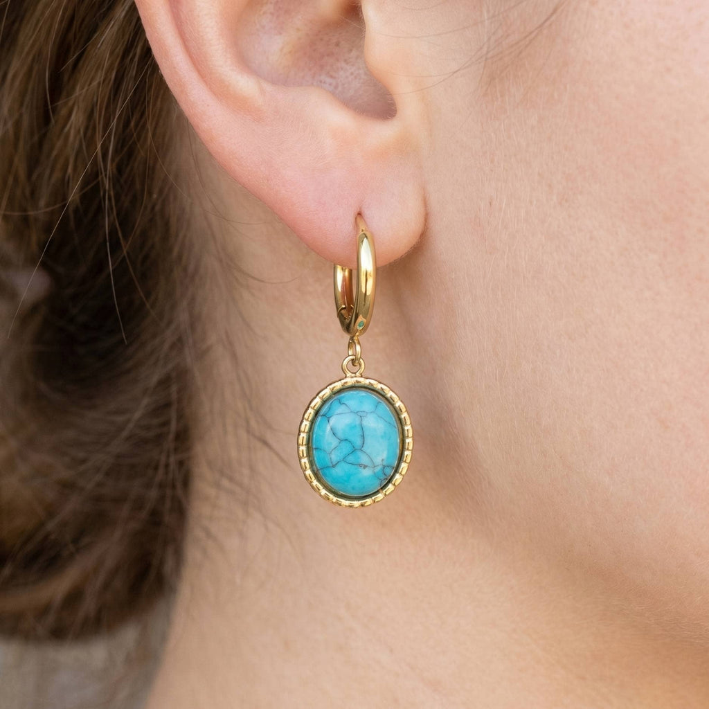 Anarchy Street’s Oval Turquoise Stone Drop Earrings add a vibrant touch for fans of classic turquoise styles and modern statement pieces alike.