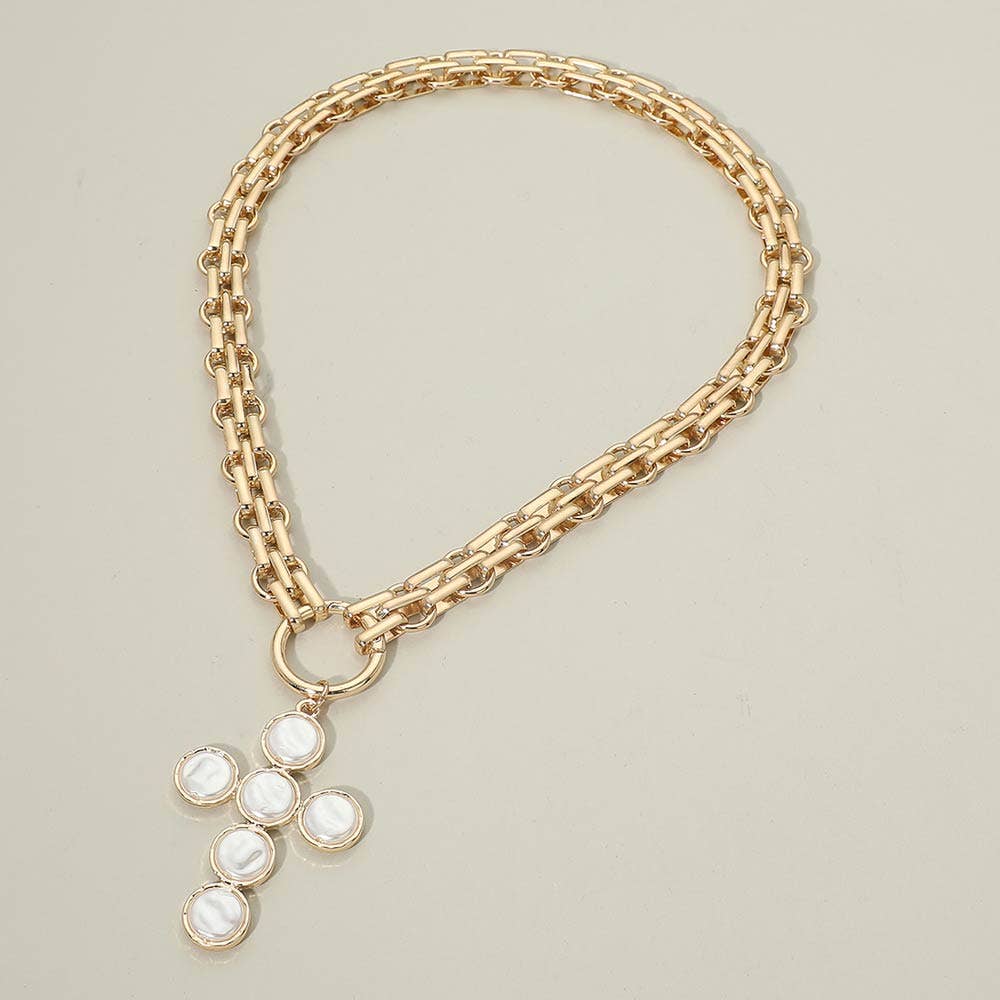 Sensibling Corp.’s Pearl Cross Charm Pendant Chunky Chain Statement Necklace is displayed on a plain, light background, showcasing its bold gold chain and large textured cross pendant adorned with six round white stones set at each end and center of the cross.