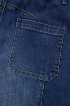 Close-up of 1 the Woman Drawstring Seam Detail Raw Hem Wide Leg Denim Pants in blue, featuring a back pocket with visible stitching that showcases the detailed craftsmanship of these deconstructed jeans.