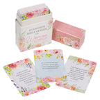 A beautifully displayed Box of Blessings Favorite Bible Verses for Women by Christian Art Gifts sits with several illustrated scripture cards spread out beside it. This inspiring collection is the perfect Christian gift, offering encouragement and faith to women through carefully chosen Bible verses.