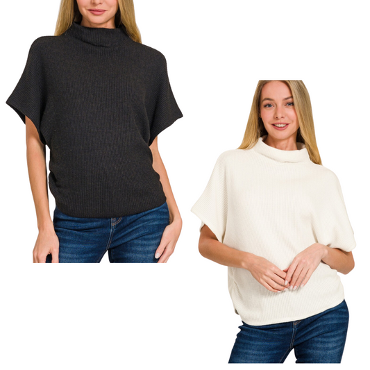 Models are stylishly presenting the FASHION GO Mock Neck Sweater with Side Shirring—one in timeless black and the other in fresh white—beautifully matched with blue jeans.