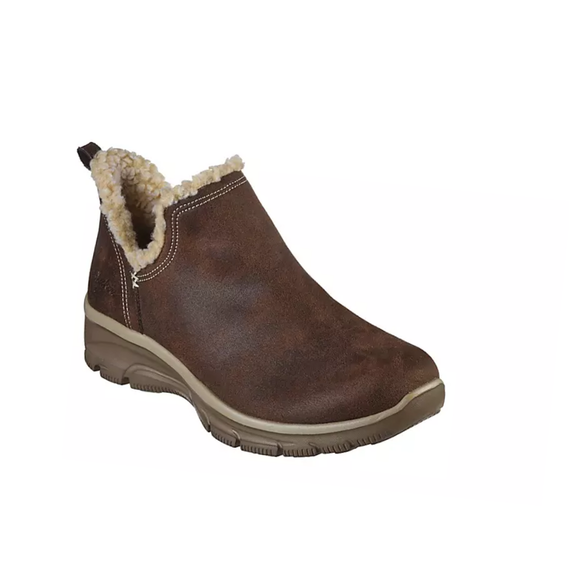 The Easy Going Buried Treasure Boot in Chocolate by Skechers features a cozy slip-on design with a warm, fuzzy lining and a sturdy textured rubber sole. Enhanced with Air-Cooled Memory Foam, this SKECHERS USA INC product ensures comfort with every step.