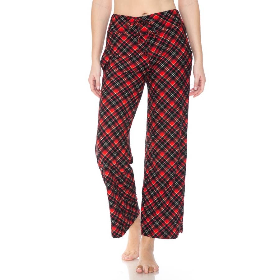 A person wears Leggings Depot Buttery Soft Print Pajama Pants with an elastic waistband, standing barefoot against a white background.