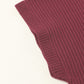 Close-up of the Shewin Patch Pocket Ribbed Knit Short Sleeve Sweater in burgundy showcases its texture and detail, ideal for transitional weather with a comfortable fit.