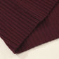 Close-up of a section of the Patch Pocket Ribbed Knit Short Sleeve Sweater by Shewin, featuring dark red ribbing on a light surface and perfect for transitional weather.