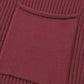 Close-up of Shewin's Patch Pocket Ribbed Knit Short Sleeve Sweater in maroon, featuring a square pocket, ideal for transitional weather.