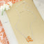The Tennessee Slogan Necklace by Seasons Jewelry, featuring a silver chain and an orange glitter enamel pendant, is displayed on a tan notebook labeled "NOTES," beside white flowers and orange lace—making it the perfect game day accessory for any fan.