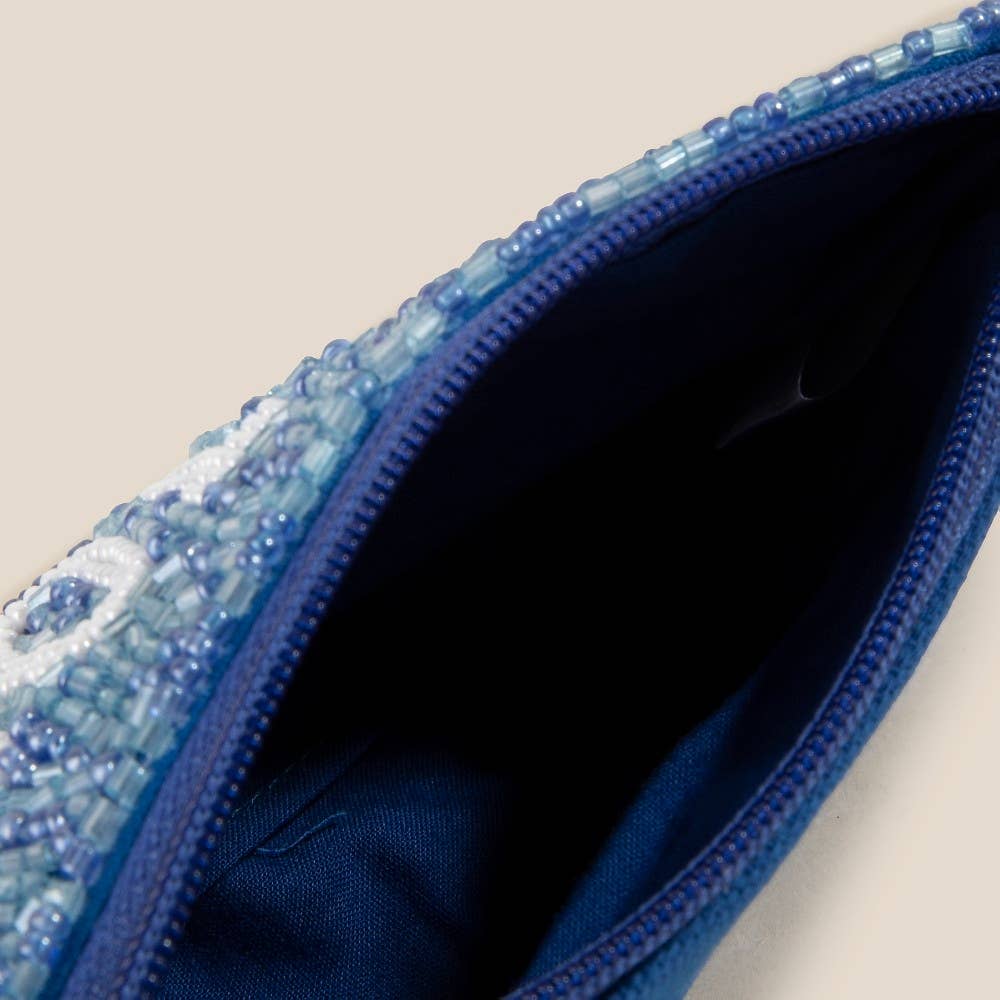 Close-up of the Anarchy Street Blue Mahjong Money Seed Beaded Coin Purse, showcasing intricate beading around the zipper and its dark interior.