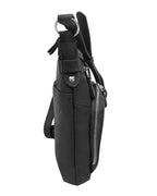 Side view of the Roma Leathers, Inc. 3018 Crossbody shoulder bag with organizer front in black cowhide leather, featuring adjustable shoulder straps, a zippered pocket, silver hardware, and a spacious main compartment against a white background.