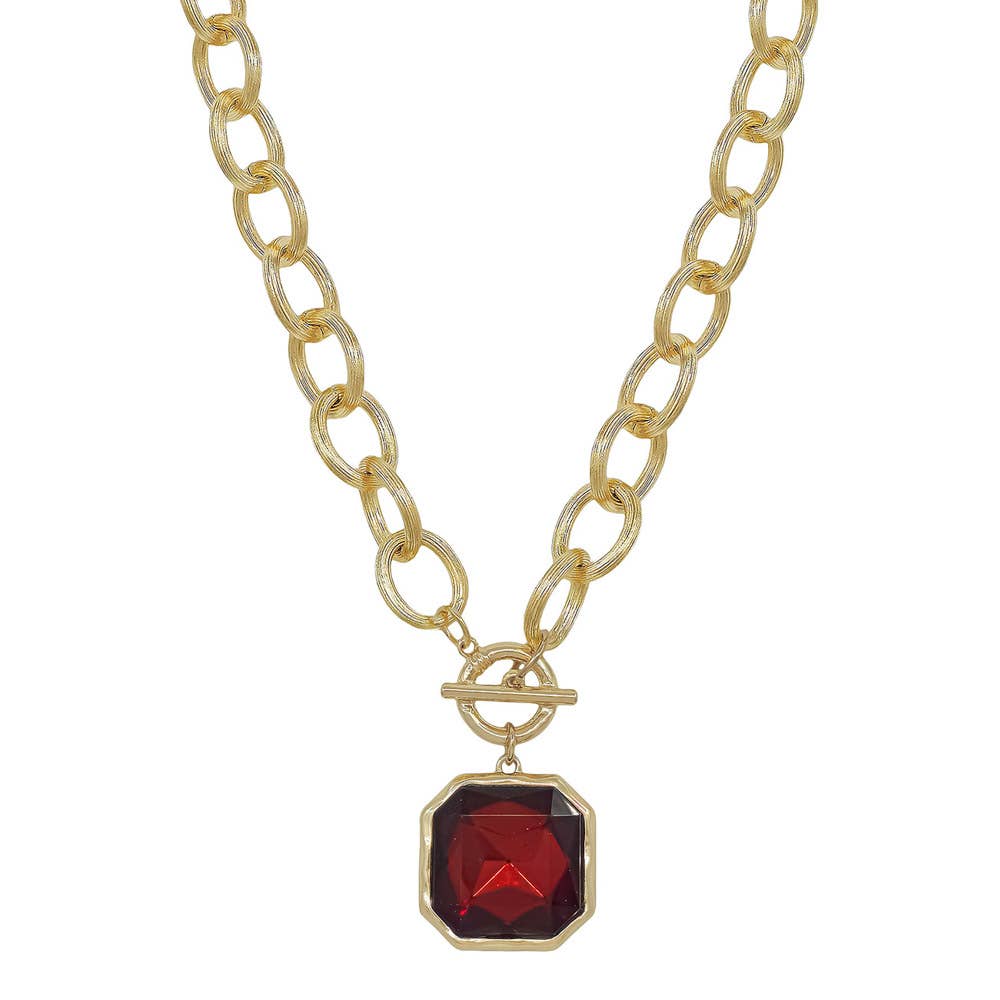 Faire CHUNKY TEXTURED CHAIN TOGGLE 25MM STONE PENDANT: a gold-toned chunky chain necklace with a toggle clasp and a square, deep red stone pendant.