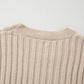 A close-up of the Shewin Khaki Cable Knit Colorblock Crew Neck Drop Shoulder Sweater is showcased against a neutral background.