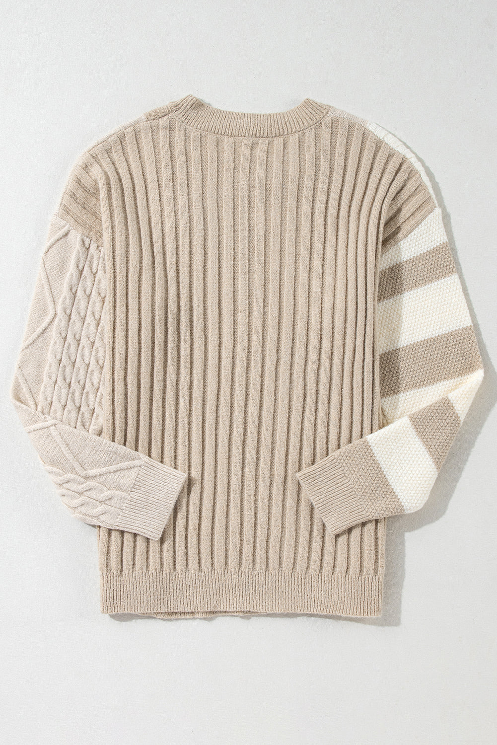 The Shewin Khaki Cable Knit Colorblock Crew Neck Drop Shoulder Sweater features a ribbed texture, highlighting cable-knit on the left sleeve and a striped design on the right.