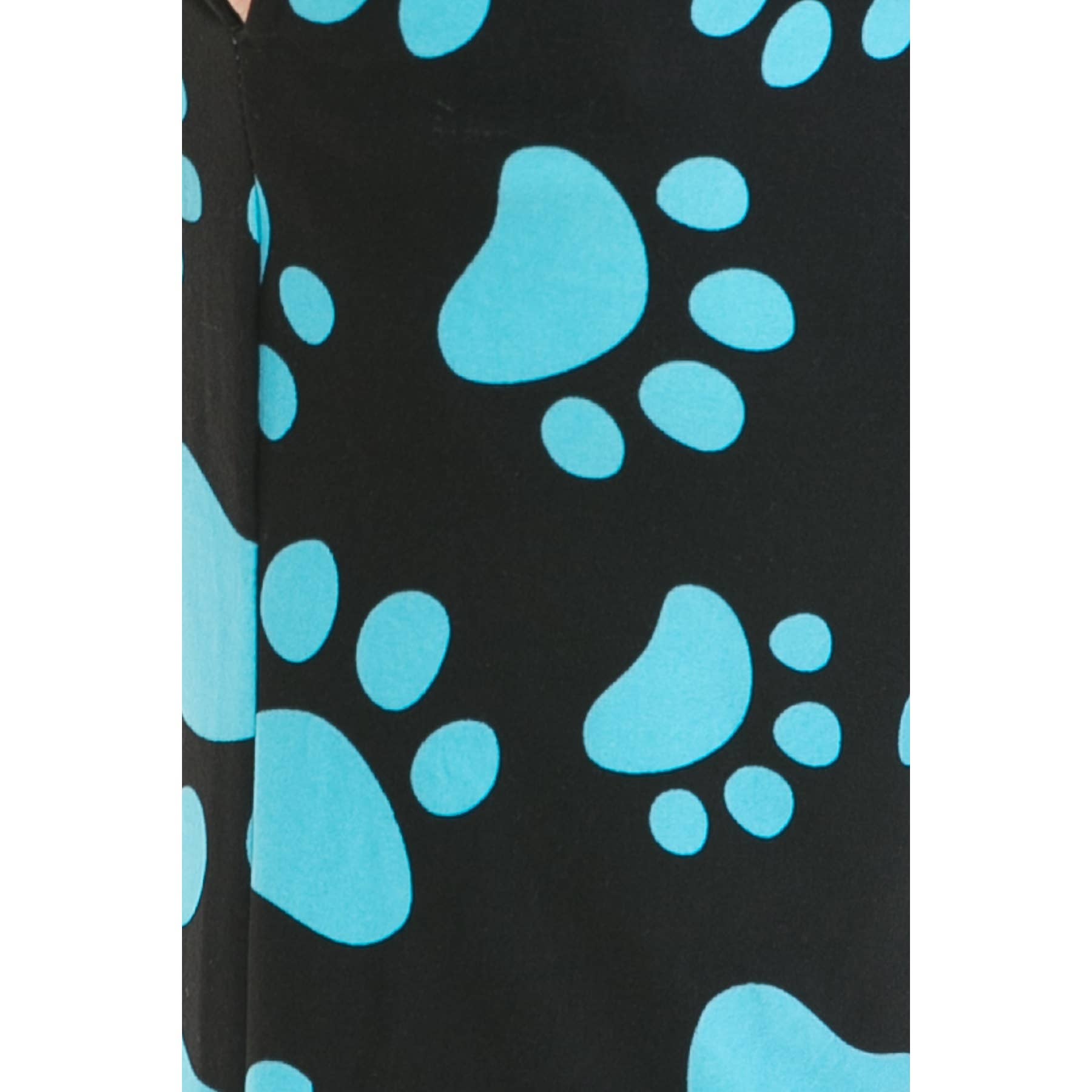 Close-up of Leggings Depot Buttery Soft Print Pajama Pants in black, showcasing a pattern of large and small blue paw prints.