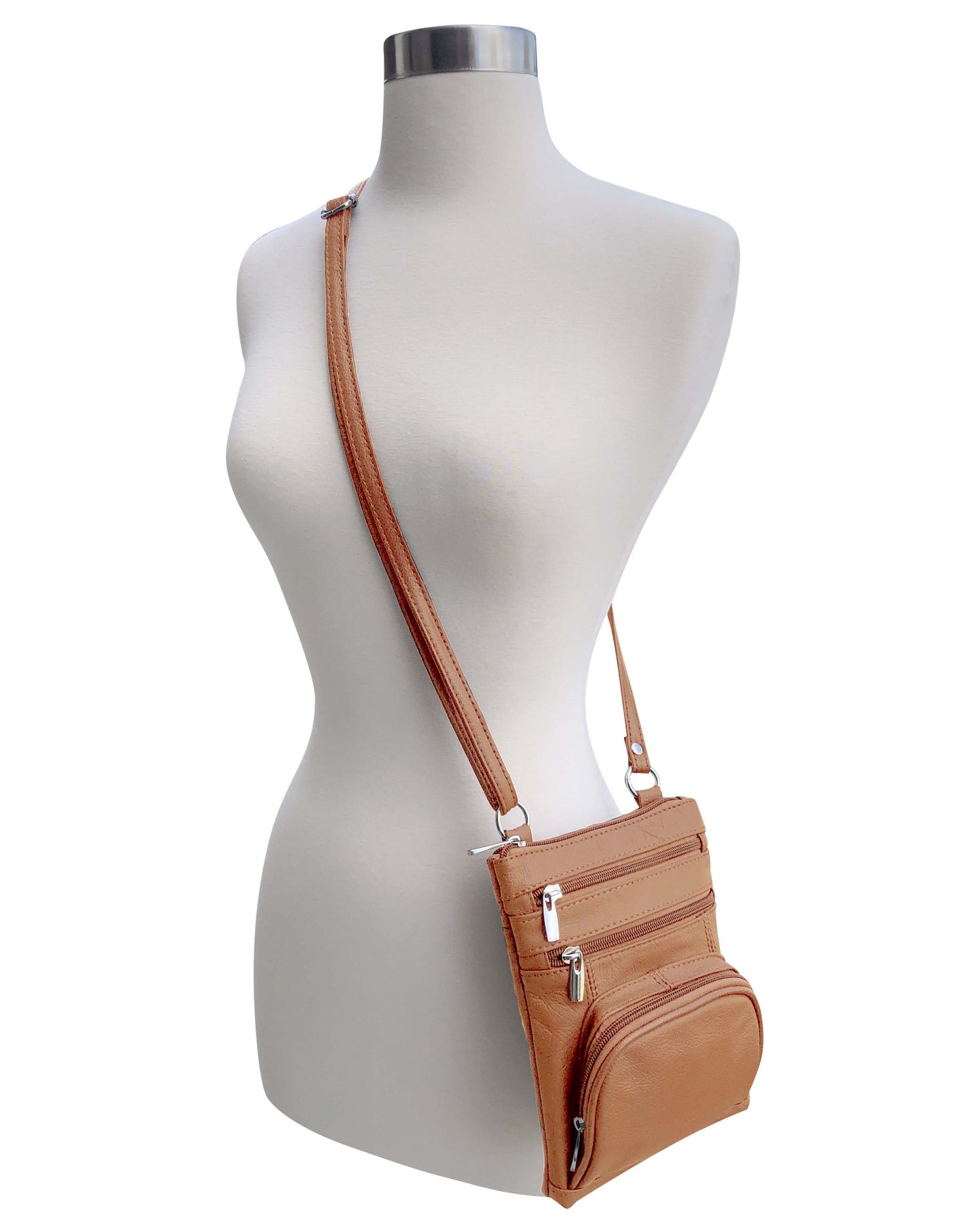 Roma Leathers, Inc. Cowhide leather crossbody with phone pocket, featuring multiple zippered compartments and an adjustable shoulder strap, displayed on a dress form mannequin against a white background.