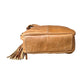 The Roma Leathers, Inc. Cowhide Leather Crossbody is a tan cowhide bag with a tassel, shown from the bottom on a white background, and features an adjustable shoulder strap for comfort and versatility.