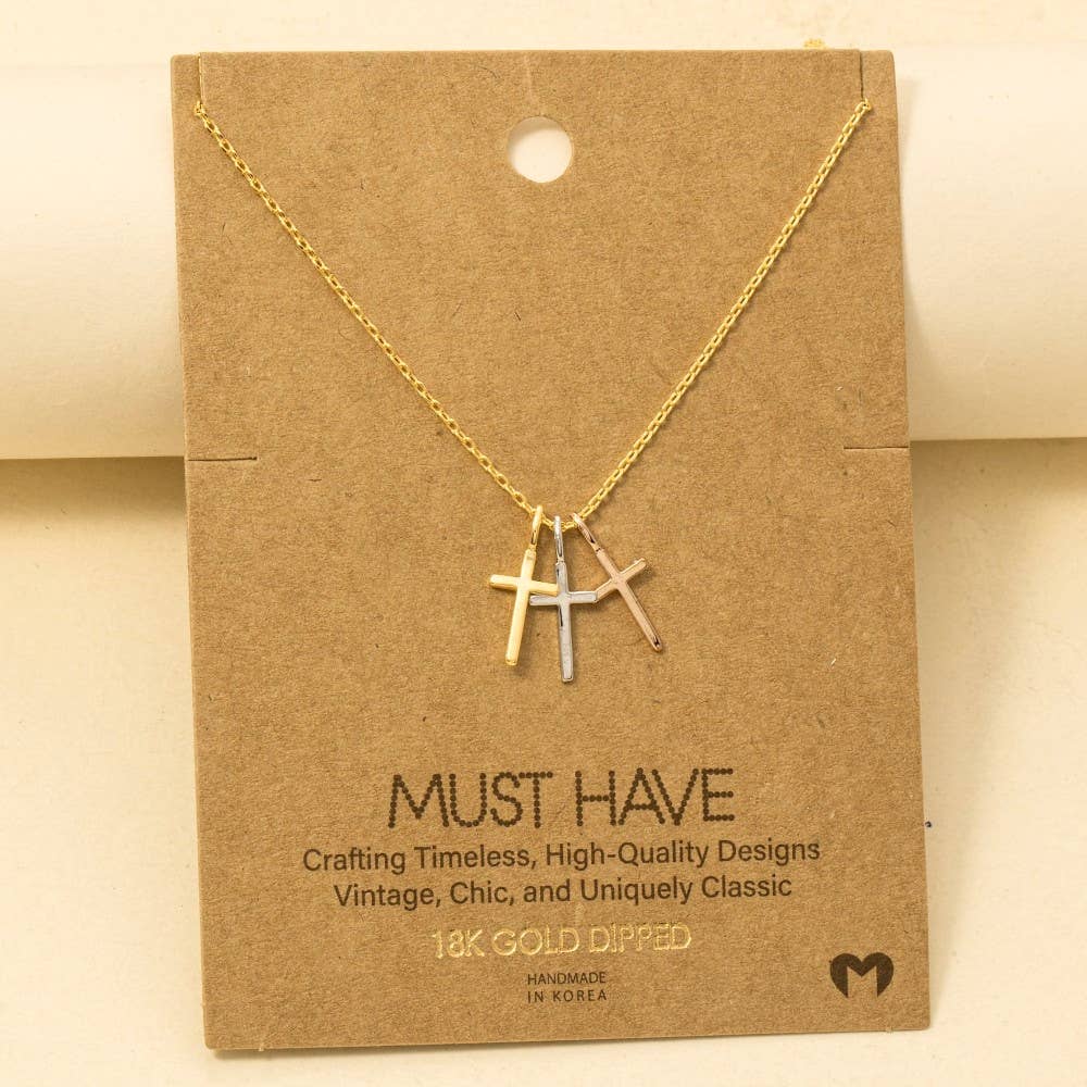 Anarchy Street's Triple Cross Pendant Necklace features 18K gold dipped pendants and comes on a "Must Have" card. Handmade in Korea, this trendy necklace adds a stylish, modern touch to any outfit.