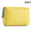 The ACCITY CARD WALLET Anti-Theft Wallet is a yellow textured leather card wallet with a zippered closure and RFID protection shown in the top right corner, blending style with security.
