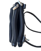 Faire 3099 Small Horizontal Crossbody Bag in small black cowhide leather with two zippered compartments, silver-tone hardware, and a shoulder strap.