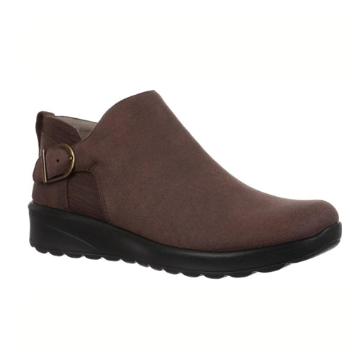 The Get Together Boot in Durango by BZEES, from CALERES INC, is a single brown slip-on shoe with a black sole and a decorative brass buckle on the side, featuring BZEES cloud technology for extra comfort.