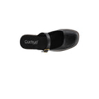 A single black Me Time Wedge clog-style shoe with a strap, viewed from above, features the “CORKY’S FOOTWEAR INC” logo on the insole—an ideal choice for those seeking comfortable wedge sandals.