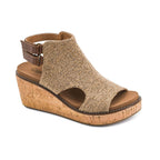 The Falling Hard Wedge by CORKY’S FOOTWEAR INC showcases a tan platform design with a cork wedge sole, a textured woven upper, open toe, and an adjustable ankle strap with buckle, photographed on a white background.