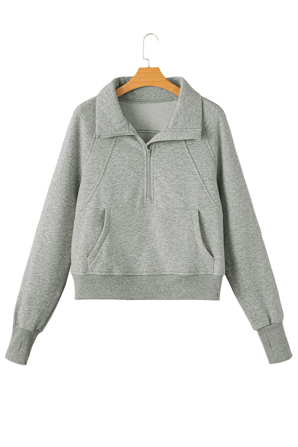 A person wears a gray, zip-up stand collar sweatshirt with ribbed thumbhole sleeves from Shewin, paired with white shorts.