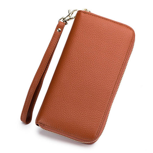 The ACCITY ZIPPER TASSEL ANTI-THEFT BRUSH LEATHER WALLET, featuring a wrist strap, is shown on a white background, blending style and convenience.