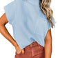 A person models Shewin's Patch Pocket Ribbed Knit Short Sleeve Sweater in light blue with brown pants on a white background, showcasing an ideal ensemble for transitional weather.