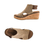 Introducing the Falling Hard Wedge by CORKY’S FOOTWEAR INC, a tan wedge sandal designed with a textured woven upper, cork platform wedge sole, open toe, and ankle strap—displayed from both side and top views.