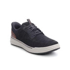 SKECHERS Slip-ins Relaxed Fit Sterling - Ramone men’s sneaker in black mesh features a white sole, brown heel accents, and black laces, shown at an angled front-left view. Combining casual comfort with modern style, this SKECHERS design offers a Relaxed Fit for all-day wear.