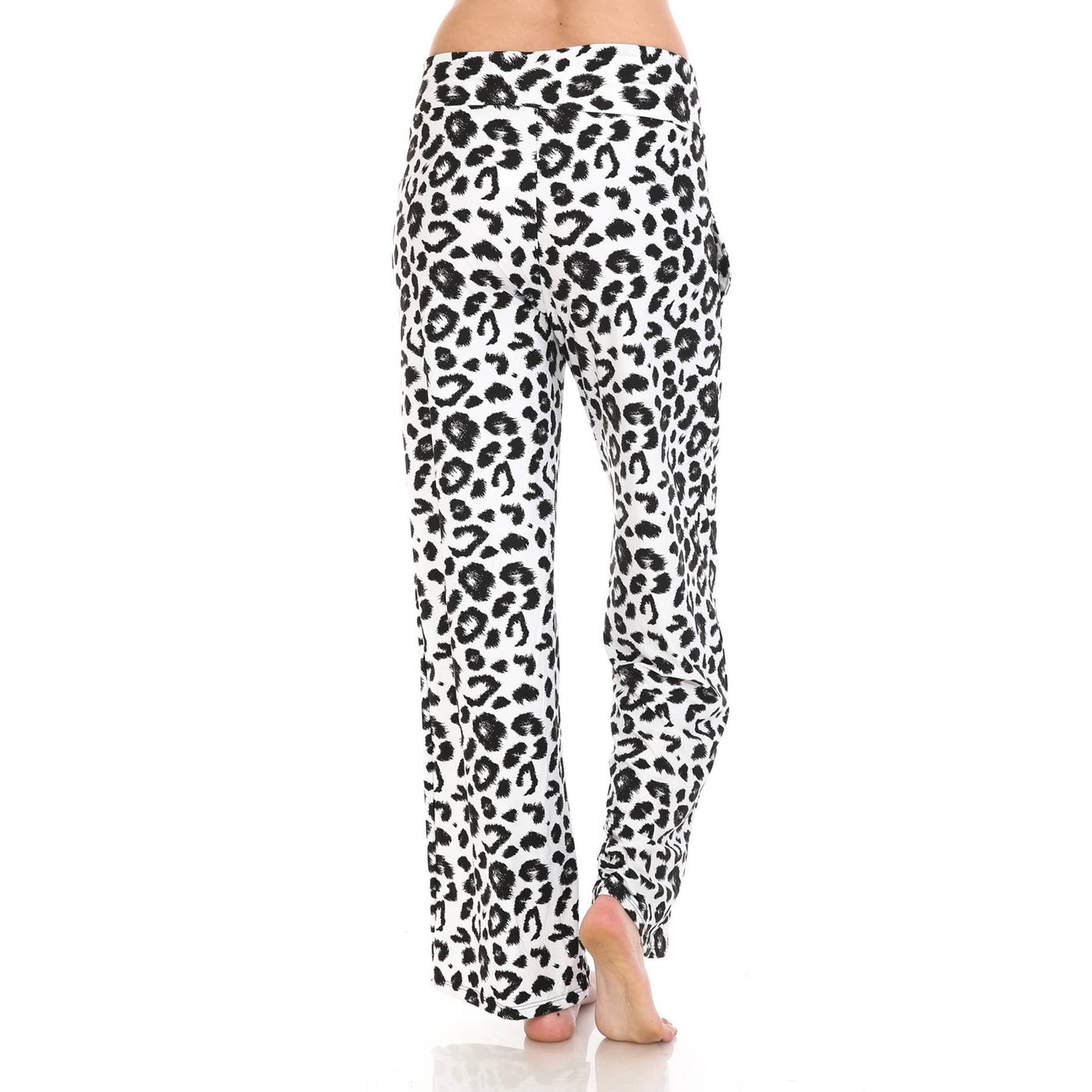 Model wears Leggings Depot Buttery Soft Print Pajama Pants featuring a black leopard print and elastic waistband, shown barefoot from the back on a white background.