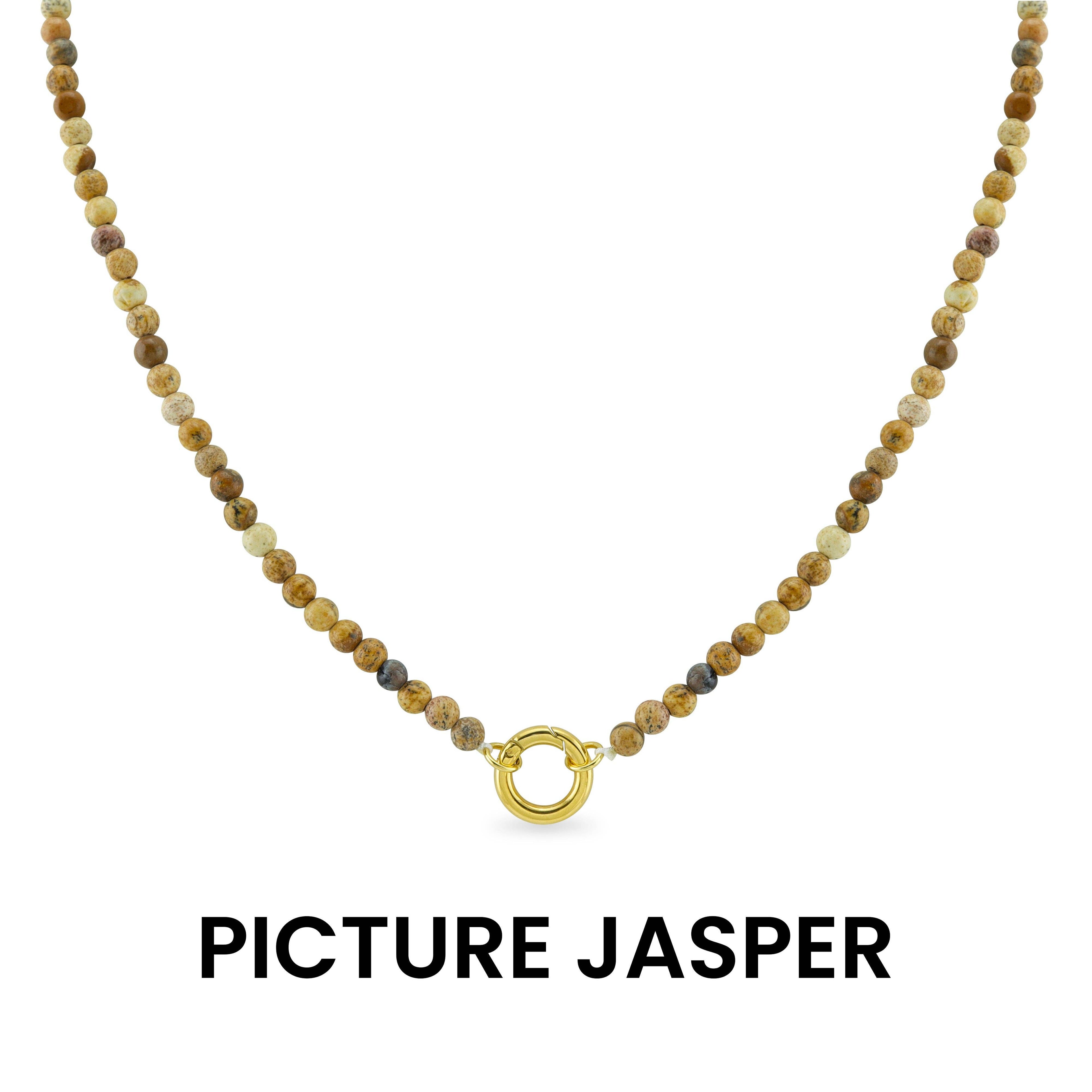 Introducing the WJW Semi Precious Natural Stone Charm Keeper Necklace, crafted with round, earth-toned Picture Jasper beads and highlighted by a central 18K Gold PVD Coated clasp. Presented on a white background, this necklace seamlessly combines the natural elegance of semi precious stones with luxurious gold accents.