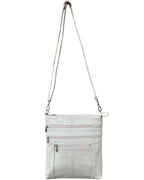 The Roma Leathers, Inc. cowhide leather crossbody bag features an adjustable strap and three front zippered pockets, shown on a plain white background.