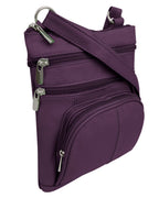 The Roma Leathers, Inc. Cowhide Leather Crossbody features a phone pocket on the back, three zippered compartments, and a long adjustable strap, shown here in purple leather against a white background.