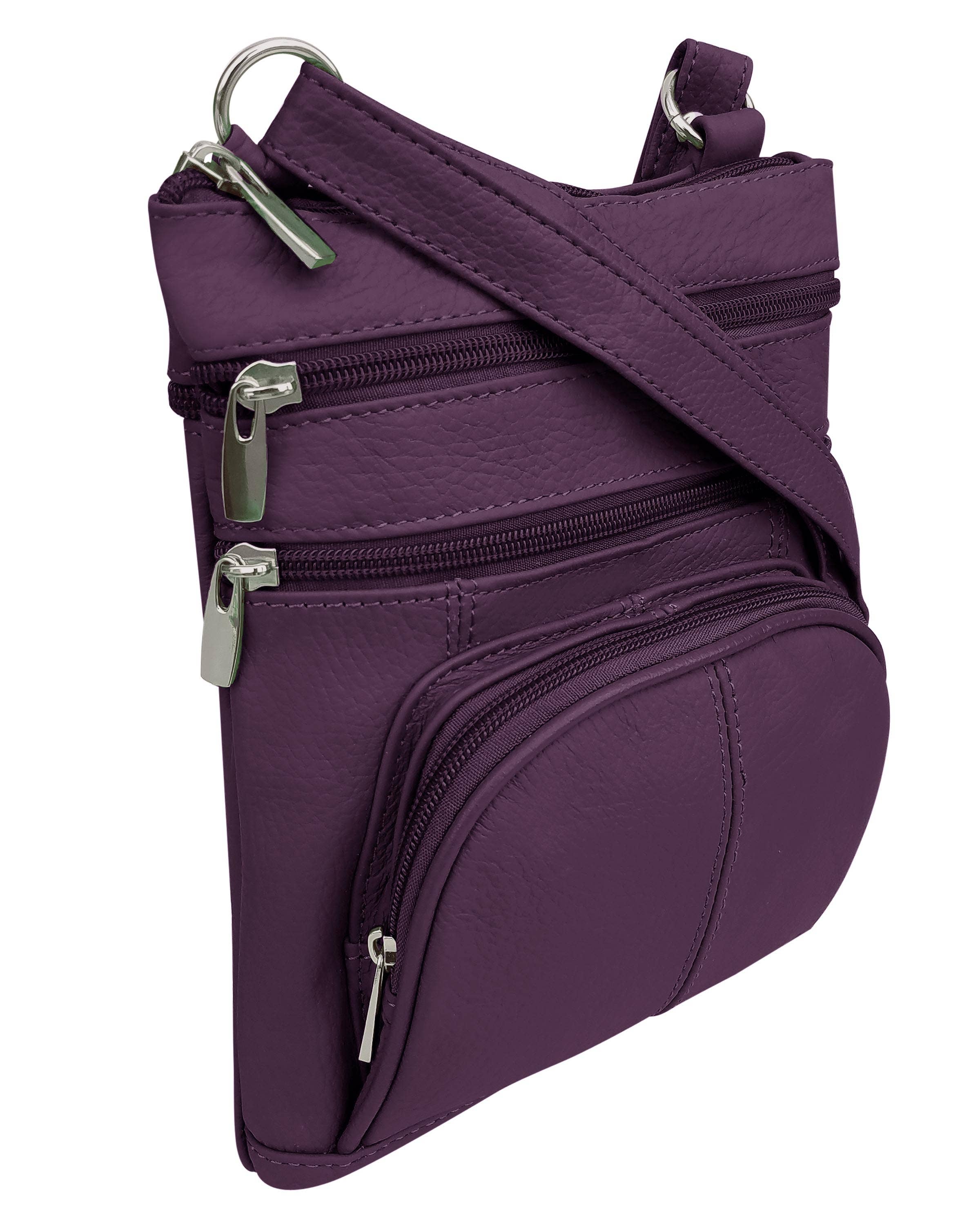 The Roma Leathers, Inc. Cowhide Leather Crossbody features a phone pocket on the back, three zippered compartments, and a long adjustable strap, shown here in purple leather against a white background.