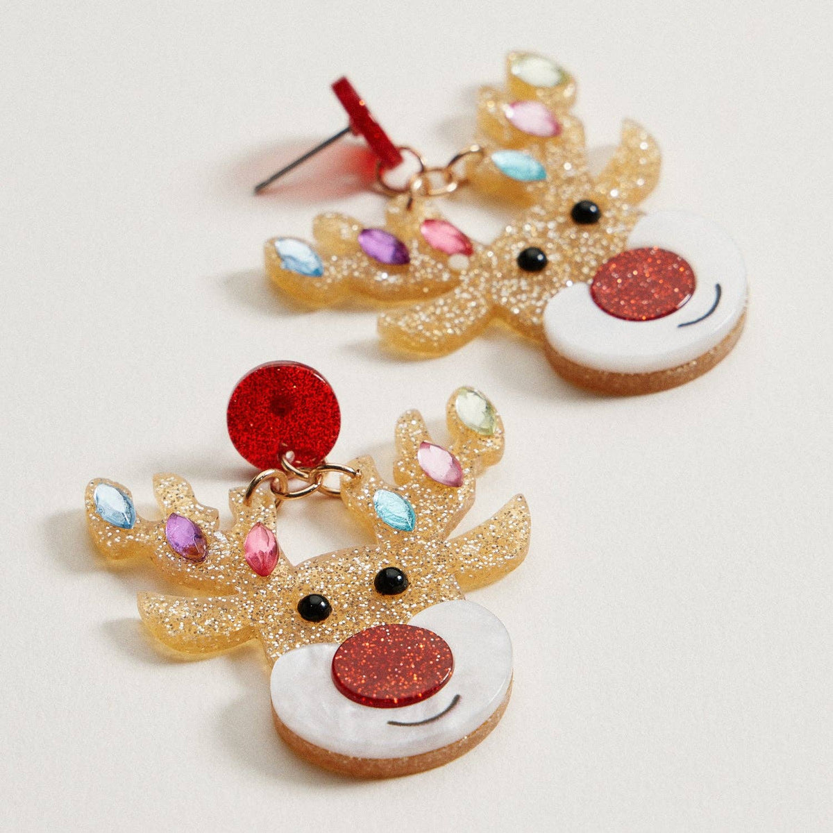 Glitter Rudolph Reindeer Earrings featuring gold bodies, red glitter noses, and colorful gem lights on the antlers.