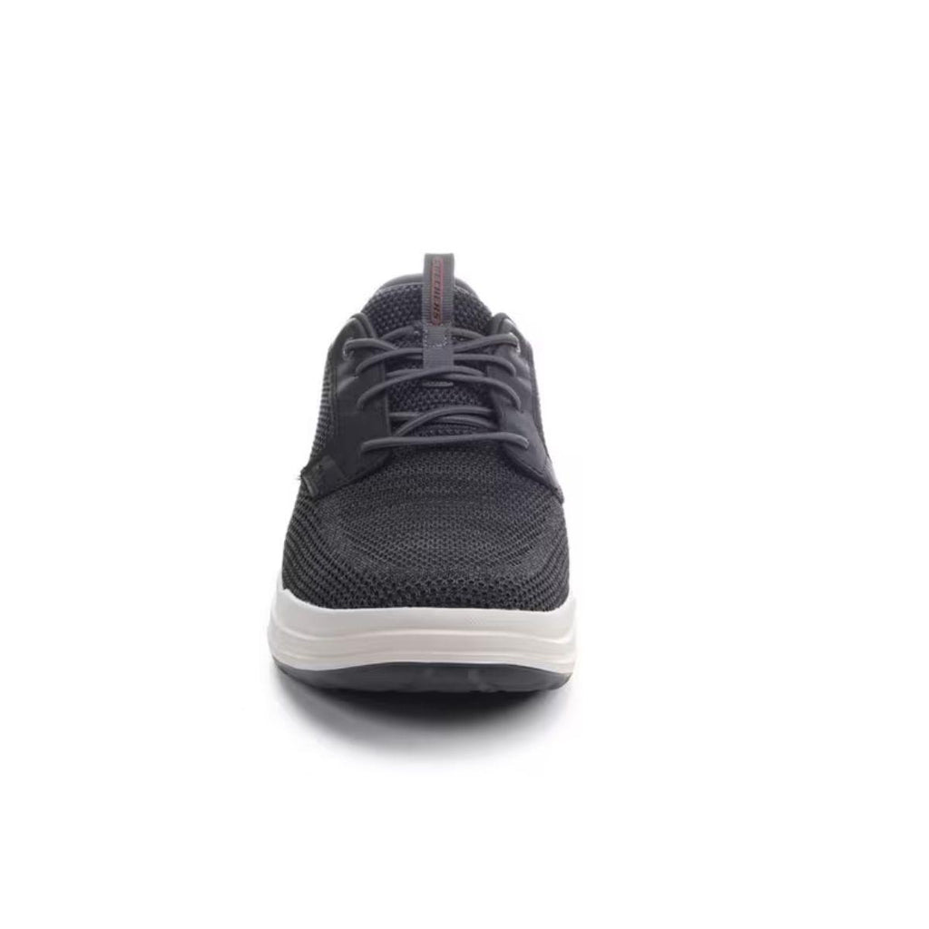Front view of a single black SKECHERS Slip-ins Relaxed Fit Sterling - Ramone athletic shoe with a white sole, shown on a plain white background.