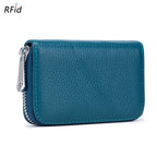 The ACCITY CARD WALLET Anti-Theft Wallet is a teal leather card wallet with a zipper closure, visible stitching, and RFID protection branding in the top left corner for added security.