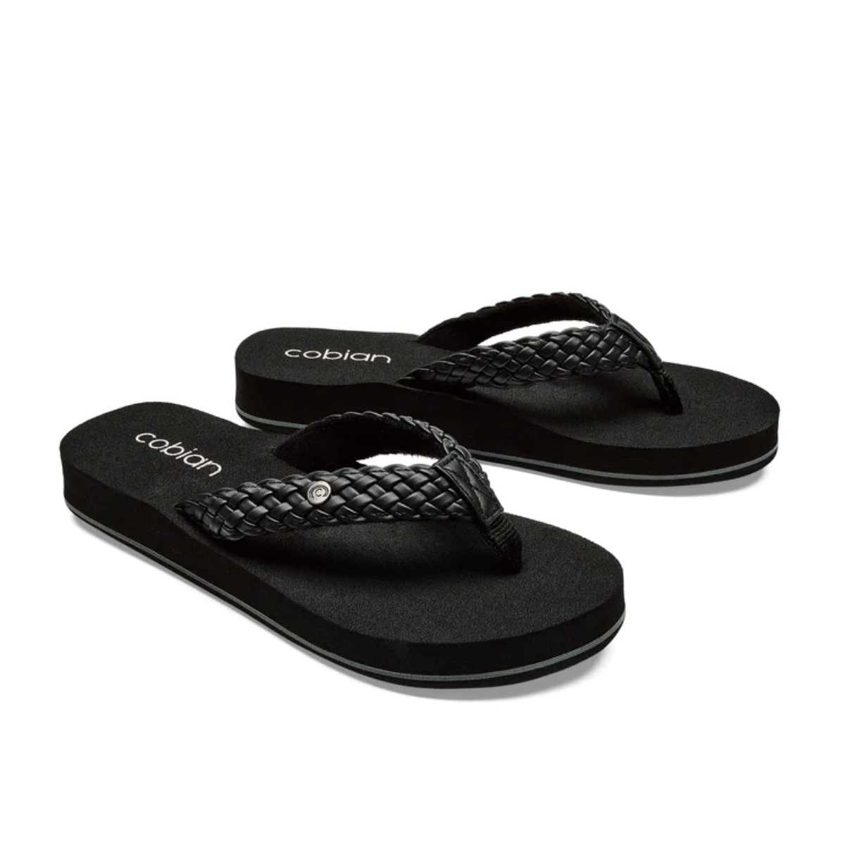 A pair of black Braided Bounce flip flops by Cobian on a white background.