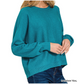 A person wears the Zenana Viscose Front Seam Round Neck Sweater, featuring long sleeves and ribbed cuffs and hem in teal, paired with dark blue jeans.