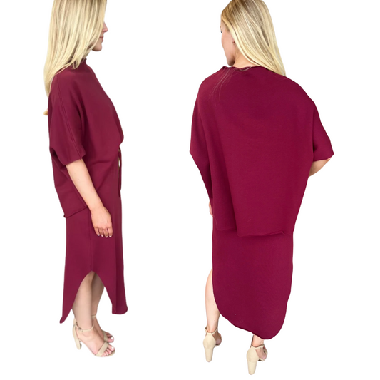 Woman modeling Carol Christian's Mock Neck Terry Skirt Set in burgundy, featuring a loose fit, short sleeves, soft terry fabric, side slits, and shown from side and back on a white background.