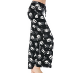 Dressed in FASHION GO's buttery soft pajama pants featuring a playful white panda print and an elastic waistband, a person stands barefoot, savoring the ultimate comfort.