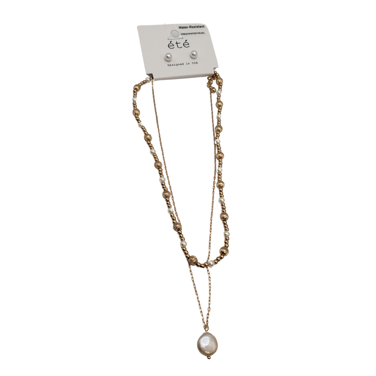 The SPECIAL EFFECTS 2 Row Beads and Pearl Necklace and Earrings Set features a pearl pendant on a card labeled "été," with designer-inspired details for a sophisticated look.