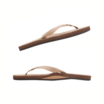 Two RAINBOW SANDALS Single Layer Premier Leather sandals for ladies, featuring arch support and a 1/2" narrow strap, are shown in profile with beige uppers and brown soles on a white background.