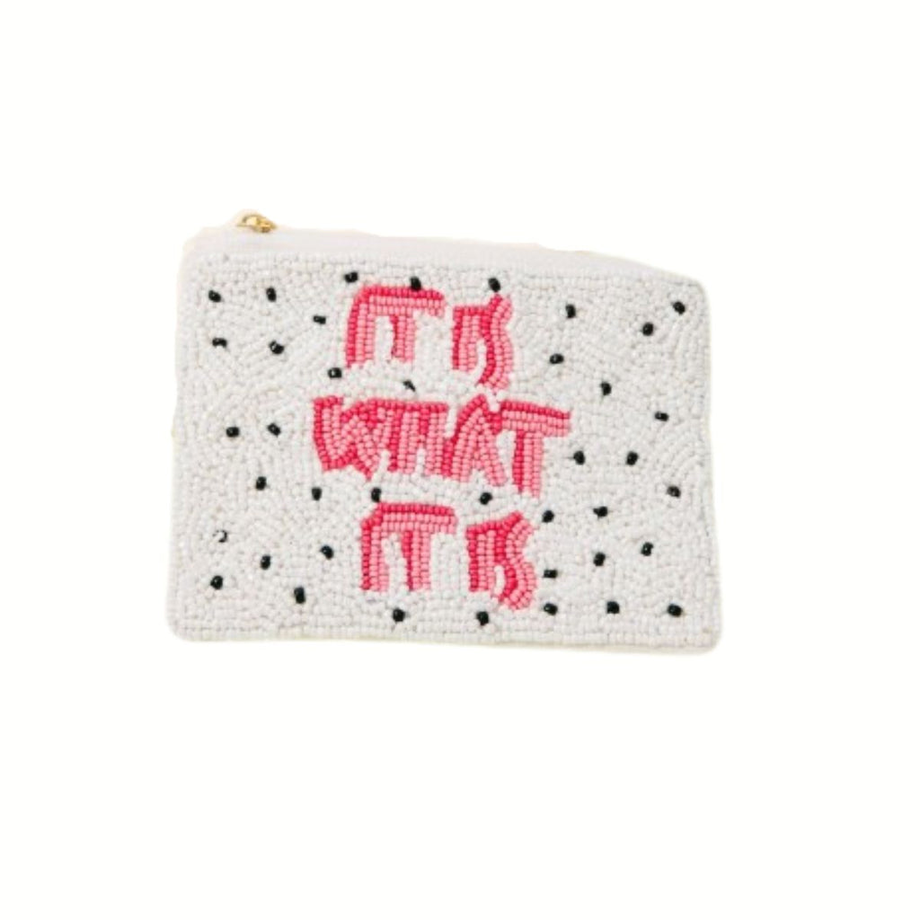 The Wona Trading Seed Bead Accented Mini Pouch Bag Assorted is a small white beaded coin pouch with black dots and "IT IS WHAT IT IS" in pink, making it a playful fashion accessory and an ideal gift.